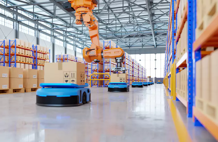 A long aisle in a warehouse with rows of shelves filled with boxes and pallets. The shelves are tall and reach almost to the ceiling. The lighting is dim, and the air is musty.